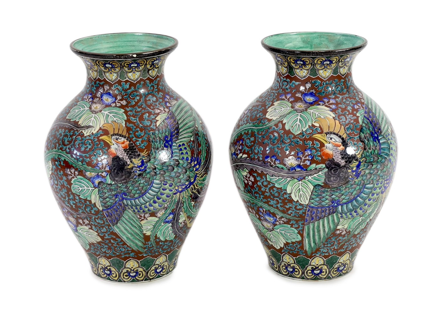 A pair of massive Japanese Kutani porcelain vases, Meiji period, influenced by de Morgan designs, 61.5cm high, one repaired